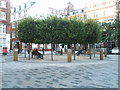 Circular seated area in the middle of Devonshire Square