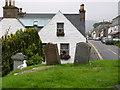 On the small cemetery in the corner of the A835 in Ullapool