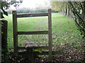 Stile on a path beside Pendrell Hall