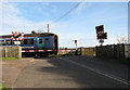 TG2925 : Level crossing on Station Road by Evelyn Simak