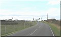 View west along the A4080 towards Glan Morfa and the Anglesey Golf Club Clubhouse