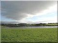 A man made lake at Plas Llanfaelog Farm