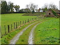 Track to a house on the hill