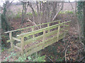 Footbridge on the path to Detton Hall