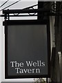 Sign for the Wells Tavern