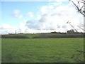 View across pasture land towards Grugor-bach farmhouse