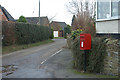 Postbox and village street