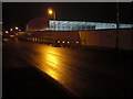 Asda store, building site lit at night