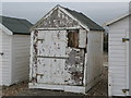 Beach hut in serious need of TLC