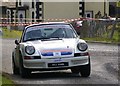 Rally car on minor road