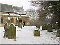 NY8355 : The churchyard of St. Cuthbert's Church, Allendale, under snow by Mike Quinn