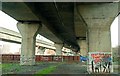 J3475 : Under the road and railway, Belfast by Albert Bridge