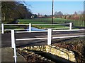 Road bridge and stream leading to Bradbourne House