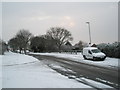 Junction of a snowy Lime Grove and Leominster Road