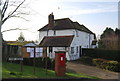 Post box, Parish notices & white cottage, end of link Rd, Tyler Hill