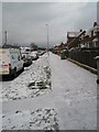 A snowy pavement in Cheltenham Road