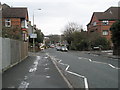 Approaching the crossroads of Wherwell, Denzil and Farnham Roads from the hospital