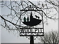 The "green children" of Woolpit on the village sign