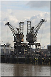 TQ2977 : Coal cranes by Alan Murray-Rust