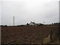 Ploughed field and buildings at Brownrigg Farm.