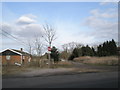 Start of footpath to Byfleet in Wisley Lane