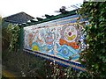 Mosaic near to the canal entrance of the Willowtree Marina