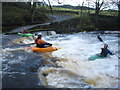 NY8738 : Paddling off the edge of the ford at Ireshopeburn by Andy Waddington