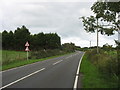 The B5110 near the junction with the lane providing a short cut to the B5108