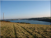 SH3594 : View eastwards towards Cemaes Bay from the neck of Wylfa Head by Eric Jones