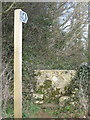 Stile and footpath sign