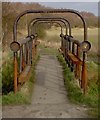 Rusty footbridge over the River Torne