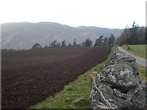 NH6036 : Ploughed Field near Dores by Sarah McGuire