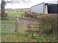 Footpath crossing Hazeldene Farm lane