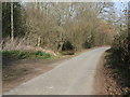 Bridleway branching off country lane