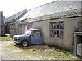 A car and a cheese-press at Wellhouse