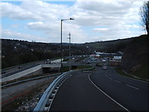 SK2960 : Supermarket, in former quarry, and A6 Matlock bypass by Peter Barr