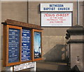 Church notice board and poster