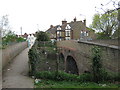 B2040 Whitstable Road and footbridge over railway