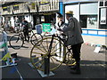 Cyclists discussing tactics in The Square