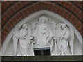 Detailed Sculpture over door to Catholic Church