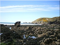 SM8422 : Shoreline rocks and Dinas Fach by Richard Law