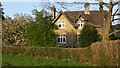 House and footpath near Spreakley