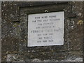 Plaque on the Alms houses, The Street