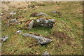 SX5869 : Cist on slopes of Down Tor by Guy Wareham