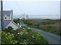 Lane in Rhosneigr with castellated house