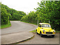 Yellow Morris Minor on Vicarage Road