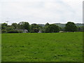 View across field to converted buildings at Stantons Farm