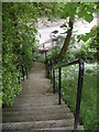 Steps to a footbridge over Hazledene Burn