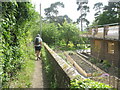 Wessex 100  competitors passing  Steep Church