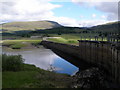 NN5893 : Dam on the River Spey by John Ferguson